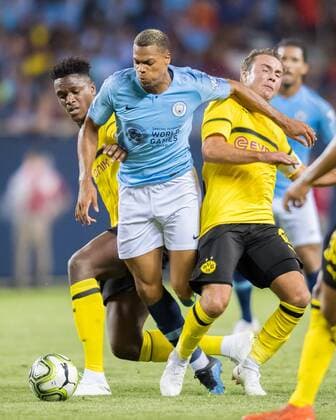 CHICAGO, IL - JULY 20: Manchester City F.C. forward Lukas Nmecha (43) and Borussia Dortmund defender Dan-Axel Zagadou (2) battle for the ball during an International Champions Cup match on July 20, 2018, at Soldier Field in Chicago, IL. (Photo by Patrick Gorski Icon Sportswire) SOCCER: JUL 20 International Champions Cup - Manchester City FC v Borussia Dortmund Icon20071862 EDITORIAL USE ONLY