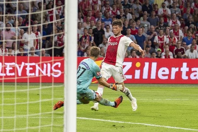 AMSTERDAM, Ajax - Sturm Graz , football, season 2018-2019, Johan Cruijff Arena , 25-07-2018, Johan Cruijff ArenA , UEFA Champions League second qualifying round , 1st leg , Sturm Graz keeper Jorg Siebenhandl and Ajax player Klaas Jan Huntelaar during the match Ajax - Sturm Graz. Finals score 2-0 . Ajax - Sturm Graz  x2363755x