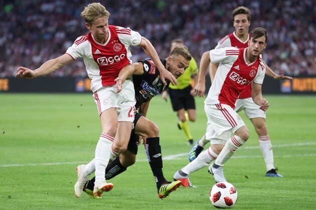 SOCCER - UEFA CL quali, Ajax vs Sturm AMSTERDAM,NETHERLANDS,25.JUL.18 - SOCCER - UEFA Champions League qualification, AFC Ajax Amsterdam vs SK Sturm Graz. Image shows Frenkie de Jong (Ajax), Sandi Lovric (Sturm) and Nico Tagliafico (Ajax). GEPAxpictures xChristianxWalgram