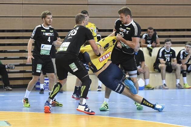 Handball Test match Rhein Vikings vs Rhein Neckar Löwen on 25 07 2018 at the Castello in Düsseldorf Rhine Viking Teo Coric Nr 18 and Rhine Viking Nils Artmann Nr 23 against Rhein Neckar Loewe Jesper Nielsen Nr 36 wd
