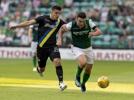 26th July 2018, Easter Road, Edinburgh, Scotland; UEFA Europa League 2nd qualifying round, 1st leg, Hibernian versus Asteras Tripolis; Franco Bellocq of Asteras Tripoli FC is outpaced by John McGinn of Hibernian  ActionPlus12050650 AlanxRennie