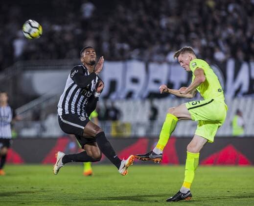 26th July 2018, Partizan Stadium, Belgrade, Serbia; UEFA Europa League 2nd qualifying round, 1st leg, FK Partizan versus FK Trakai; Ricardo of Partizan cannot stop the clearance from Justinas Janusevskis of Trakai  ActionPlus12050679 NikolaxKrstic