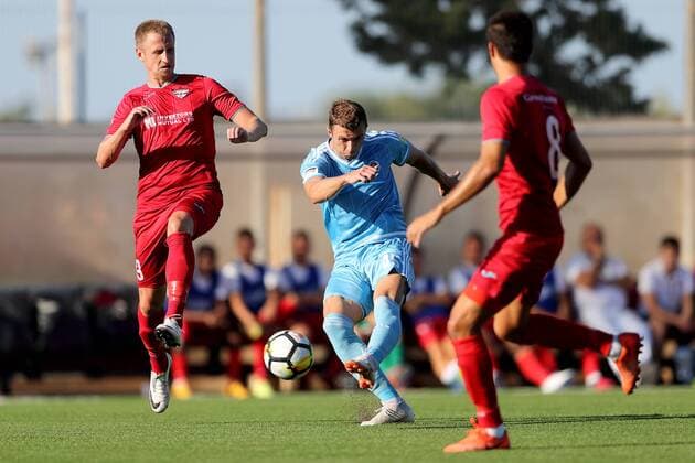 26 07 2018 - National Stadium, Ta Qali, Malta UEFA Europa League 2018 2019 Second Qualifying Round, 1st Leg Aleksandar ÄaavriÄ of SK Slovan Bratislava (C) shoots during the UEFA Europa League, Second Qualifying Round, first leg match between Balzan FC of Malta and SK Slovan Bratislava at the Centenary Stadium, Ta Qali, Malta on 26 July, 2018. Balzan FC won the first leg 2-1. Balzan FC v SK Slovan Bratislava - UEFA Europa League 2018 19 UEL_18_19
