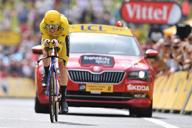 British Geraint Thomas of Team Sky wearing the yellow jersey of overall leader celebrates as he crosses the finish line at the 20th stage of the 105th edition of the Tour de France cycling race, a 31km individual time trial from Saint-Pee-sur-Nivelle to Espelette, France, Saturday 28 July 2018. This year s Tour de France takes place from July 7th to July 29th. DAVIDxSTOCKMAN  x05393910x