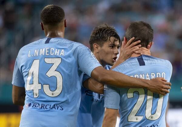 MIAMI GARDENS, FL - JULY 28: Manchester City s Bernardo Silva (20) reacts after scoring a goal and is congratulated by Lukas Nmecha (43) and Brahim Diaz during the International Champions Cup game between FC Bayern Munich and Manchester City FC on July 28, 2018 at the Hard Rock Stadium in Miami Gardens, Florida. (Photo by Doug Murray Icon Sportswire) SOCCER: JUL 28 International Champions Cup - FC Bayern Munich v Manchester City FC Icon79620180728004 EDITORIAL USE ONLY
