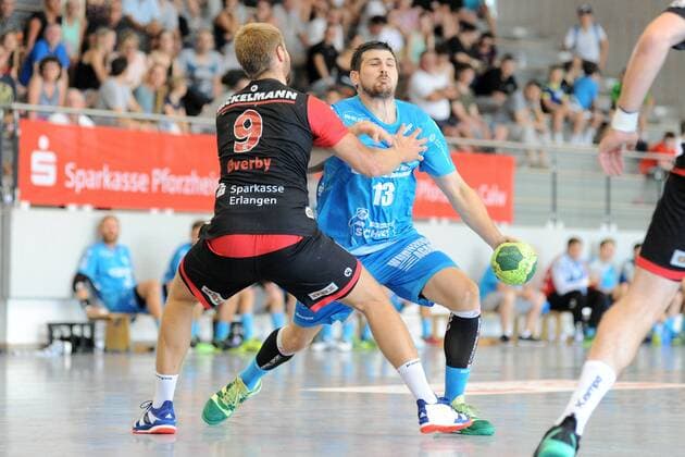 Robert Markotic TVB 1898 Stuttgart 13 against Petter Overby HC Erlangen 9 Handball men preparation tournament 54 Sparkassen Cup Altensteig match for Platz3 29 07 2018 Photo TBaur Eibner HC Erlangen vs TVB 1898 Stuttgart Esslingen Copyright: xEIBNER TobiasxBaurx EP_TBR
