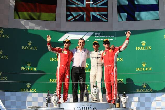 29th July 2018, Hungaroring, Mogyorod, Hungary; Hungarian Formula One Grand Prix, race day; Mercedes AMG Petronas Motorsport, Lewis Hamilton takes the win followed by Scuderia Ferrari, Sebastian Vettel and Kimi Raikkonen  ActionPlus12051623 Octane