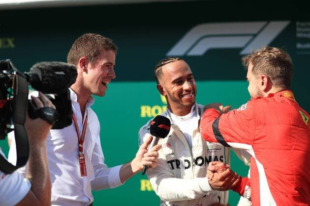 29th July 2018, Hungaroring, Mogyorod, Hungary; Hungarian Formula One Grand Prix, race day; Mercedes AMG Petronas Motorsport, Lewis Hamilton takes the win as Scuderia Ferrari, Sebastian Vettel congratulates him in parc ferme  ActionPlus12051633 Octane