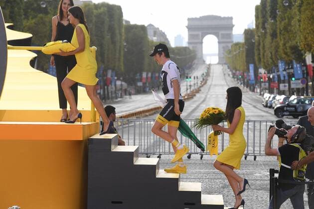 Overall winner British Geraint Thomas of Team Sky steps up to the podium, with the Arc de Triomphe in the background, after the last stage of the 105th edition of the Tour de France cycling race, 116km from Houilles to Paris, France, Sunday 29 July 2018. This year s Tour de France takes place from July 7th to July 29th. DAVIDxSTOCKMAN  x05395068x