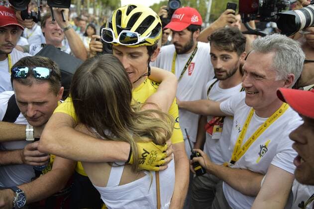 British Geraint Thomas of Team Sky and his wife celebrate after the last stage of the 105th edition of the Tour de France cycling race, 116km from Houilles to Paris, France, Sunday 29 July 2018. This year s Tour de France takes place from July 7th to July 29th. YORICKxJANSENS  x05395082x