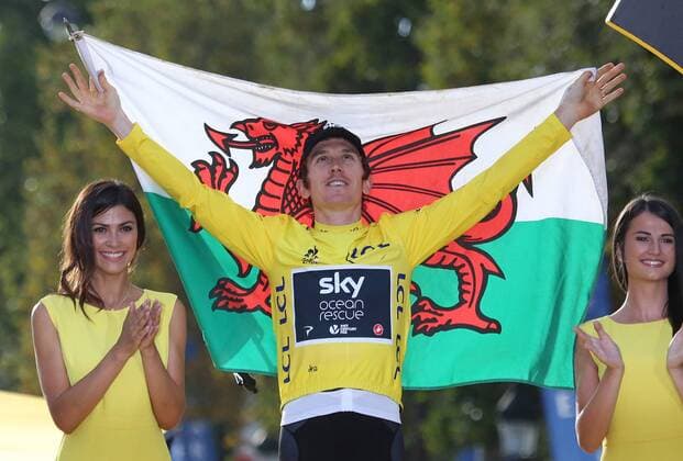 Geraint Thomas of Great Britain celebrates on the presentation podium after winning the Tour de France in Paris on July 29, 2018. Thomas claimed his first Tour de France victory, becoming the first Welshman to win the event.  PAR20180729157 DAVIDxSILPA
