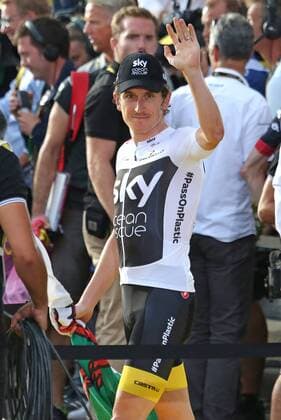 Geraint Thomas of Great Britain arrives on the presentation podium after winning the Tour de France in Paris on July 29, 2018. Thomas claimed his first Tour de France victory, becoming the first Welshman to win the event.  PAR20180729015 DAVIDxSILPA