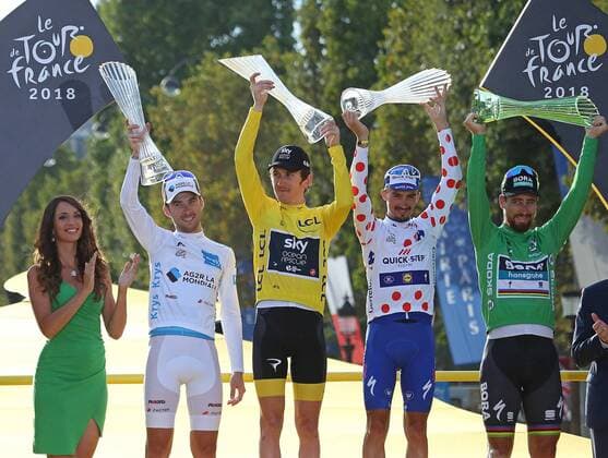(From L to R) Pierre Roger Latour of France (best young rider), Geraint Thomas of Great Britain (overall winner), Julian Alaphilippe of France (best climber) and Peter Sagan of Slovakia (current points leader) celebrate on the presentation podium after the Tour de France in Paris on July 29, 2018. Thomas claimed his first Tour de France victory, becoming the first Welshman to win the event.  PAR20180729038 DAVIDxSILPA