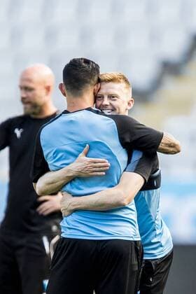 180731 Malmö FFs Anders Christiansen hugs about Sören Rieks during a training session before the Champions League match between Malmö FF and Cluj in the second qualifying round on 31 July 2018 in Malmö  Copyright: MATHILDAxAHLBERG BB180731MA029