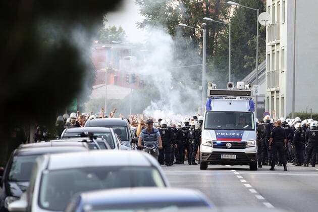 SOCCER - UEFA CL quali, Sturm vs Ajax GRAZ,AUSTRIA,01.AUG.18 - SOCCER - UEFA Champions League qualification, SK Sturm Graz vs AFC Ajax Amsterdam. Image shows fans of Ajax and police. GEPAxpictures xChristianxWalgram
