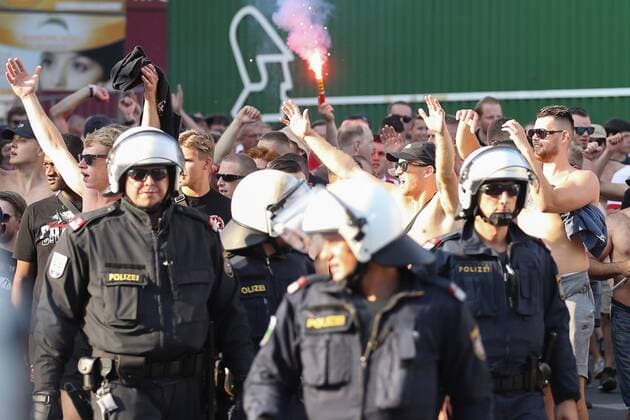 SOCCER - UEFA CL quali, Sturm vs Ajax GRAZ,AUSTRIA,01.AUG.18 - SOCCER - UEFA Champions League qualification, SK Sturm Graz vs AFC Ajax Amsterdam. Image shows fans of Ajax and police. GEPAxpictures xChristianxWalgram