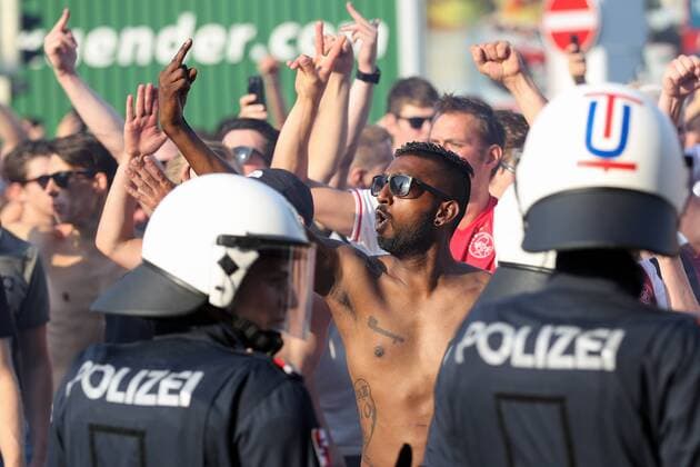 SOCCER - UEFA CL quali, Sturm vs Ajax GRAZ,AUSTRIA,01.AUG.18 - SOCCER - UEFA Champions League qualification, SK Sturm Graz vs AFC Ajax Amsterdam. Image shows fans of Ajax and police. GEPAxpictures xChristianxWalgram