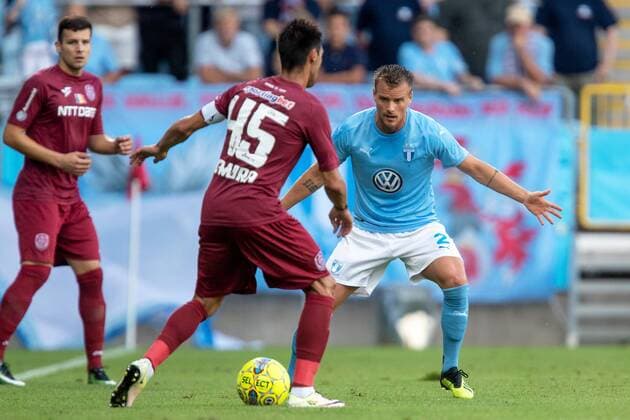 180801 Eric Larsson of Malmö FF and Camora of Cluj during the UEFA Champions League qualifying match between Malmö FF and Cluj on August 1, 2018 in Malmö Photo Ludvig Thunman BILDBYRAN Code LT 35511  Copyright: LUDVIGxTHUNMAN BB180801LT008
