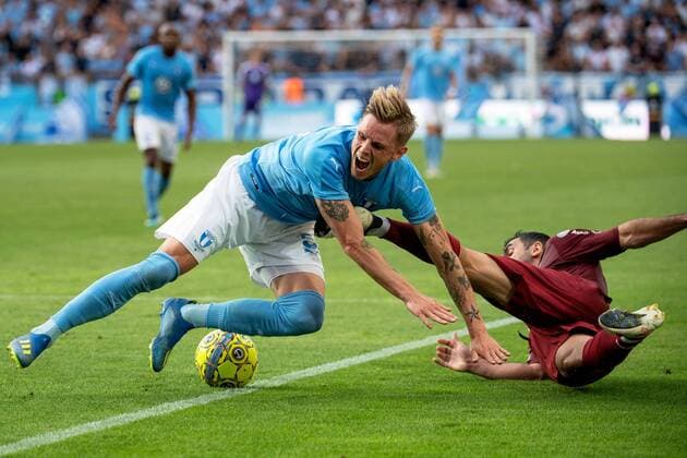 180801 Sören Rieks of Malmö FF and Juan Culio of Cluj during the UEFA Champions League qualifying match between Malmö FF and Cluj on August 1, 2018 in Malmö Photo Ludvig Thunman BILDBYRAN Code LT 35511  Copyright: LUDVIGxTHUNMAN BB180801LT022