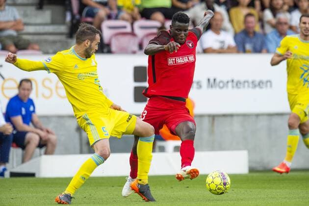 Fußball, CL Qualifikation, FC Midtjylland - FK Astana Marin Anicic ( 5 - FC Astana ) in action with Ebere Paul Onuachu 33 during UEFA Champions League, Second Qualifying Round between FC Midtjylland and FC Astana, August 1, 2018 in ARENA Herning, Denmark. , Herning Denmark  BoxAmstrupx cop103 spdk20180801-200151-L