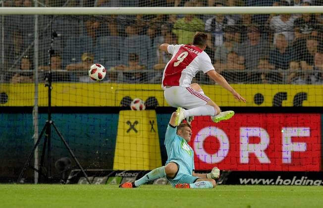 SOCCER - UEFA CL quali, Sturm vs Ajax GRAZ,AUSTRIA,01.AUG.18 - SOCCER - UEFA Champions League qualification, SK Sturm Graz vs AFC Ajax Amsterdam. Image shows Klaas Jan Huntelaar (Ajax) and Joerg Siebenhandl (Sturm). GEPAxpictures xMichaelxRiedler