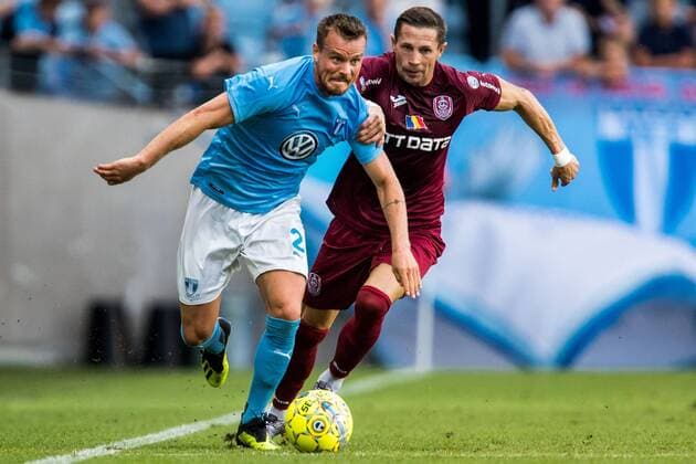 180801 or Malmö FF Eric Larsson or Malmö FF and Ciprian Deac of Cluj during the UEFA Champions League qualifying match between Malmö FF and Cluj on August 1, 2018 in Malmö Photo Mathilda Ahlberg BILDBYR N Cop 178  Copyright: MATHILDAxAHLBERG BB180801MA079