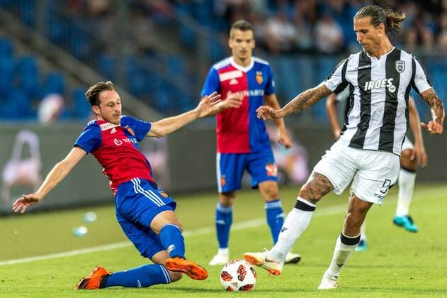 Football Champions League Second qualifying round 18 19 FC Basel 1893 FC PAOK Saloniki 01 08 2018 Luca Zuffi FCB 7 in a duel with Aleksandar Prijovi PAOK 9 in Champions League qualifying round 2 Match between FC Basel 1893 and FC PAOK Salonika on Wednesday 01 August 2018 St Jakob Park in Basel xGRGx