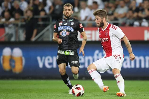 SOCCER - UEFA CL quali, Sturm vs Ajax GRAZ,AUSTRIA,01.AUG.18 - SOCCER - UEFA Champions League qualification, SK Sturm Graz vs AFC Ajax Amsterdam. Image shows Philipp Huspek (Sturm) and Lasse Schoene (Ajax). GEPAxpictures xChristianxWalgram