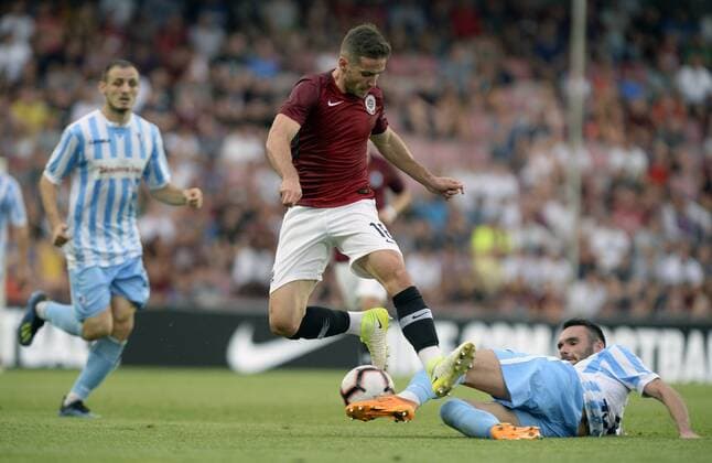 R-L Branimir Jocic (Subotica) and Alexandru Chipciu (Sparta) in action during a return match of 2nd qualifying round of UEFA Europa League between AC Sparta Praha and FK Spartak Subotica, in Prague, Czech Republic, on August 2, 2018. (CTKxPhoto KaterinaxSulova) CTKPhotoP201808020860601  suk2