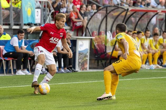 ALKMAAR , 02-08-2018 , AFAS Stadion ,season 2018 2019, Football, 2nd round Europa League qualification . AZ player Jonas Svensson and FC Kairat player Gafurzhan Suyumbayev during the match AZ - FC Kairat AZ - FC Kairat  x2373170x