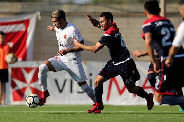 Rowen Muscat (L) of Valletta FC speeds away from the challenge of Edin RustemoviÄ‡ C) HÅ K Zrinjski during the UEFA Europa League, second Qualifying Round, second leg match between Valletta FC and HÅ K Zrinjski at the Centenary Stadium, Ta Qali, Malta on 02 August, 2018. Valletta FC v HÅ K Zrinjski UEL_18_19