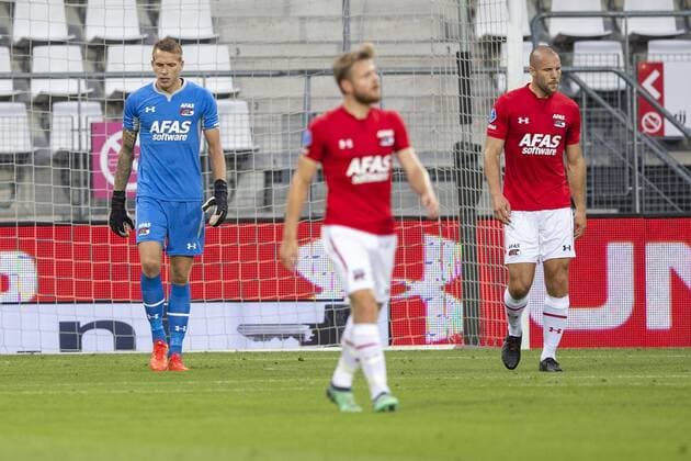 ALKMAAR , 02-08-2018 , AFAS Stadion ,season 2018 2019, Football, 2nd round Europa League qualification . AZ keeper Marco Bizot and AZ player Ron Vlaar after the 0-1 during the match AZ - FC Kairat AZ - FC Kairat  x2373213x