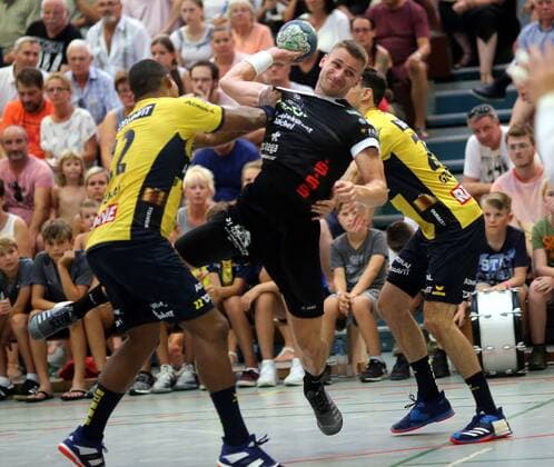 Third Handball Bundesliga MSG Grossbieberau Modau vs Rhein Neckar Löwen Friendly Match Season 2018 2019 02 08 2018 Grossbieberau by Kris Jost MSG Falken takes on Mads Mensah Larsen and Patrick Groetzki both RNL through action duel ba