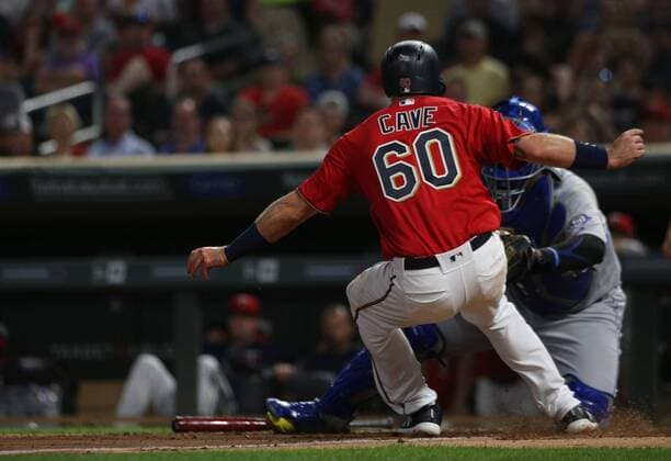 August 3, 2018 - Minneapolis, MN, USA - The Minnesota Twins Jake Cave (60) is tagged out at home plate by Kansas City Royals catcher Salvador Perez in the second inning on Friday, Aug. 3, 2018, at Target Field in Minneapolis. Kansas City at Minnesota - ZUMAm67_ 20180803_zaf_m67_031 Copyright: xAlexxKormannx