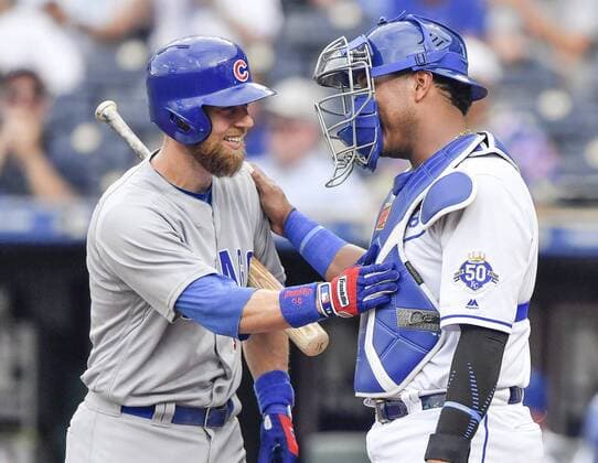 August 6, 2018 - Kansas City, MO, USA - Kansas City Royals catcher Salvador Perez greets Chicago Cubs Ben Zobrist at the plate in the first inning during Monday s baseball game on August 6, 2018 at Kauffman Stadium in Kansas City, Mo. Royals vs Cubs - ZUMAm67_ 20180806_zaf_m67_016 Copyright: xJohnxSleezerx