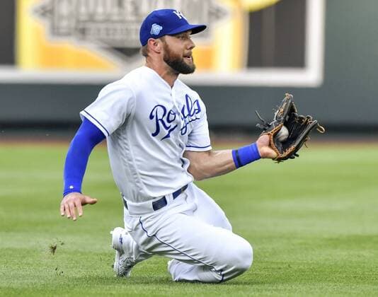 August 6, 2018 - Kansas City, MO, USA - Kansas City Royals left fielder Alex Gordon runs down a fly ball out on Chicago Cubs Anthony Rizzo in the first inning during Monday s baseball game on August 6, 2018 at Kauffman Stadium in Kansas City, Mo. Royals vs Cubs - ZUMAm67_ 20180806_zaf_m67_022 Copyright: xJohnxSleezerx