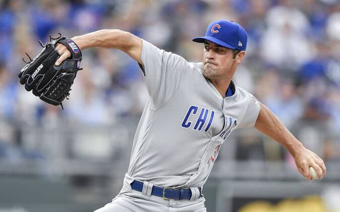 August 6, 2018 - Kansas City, MO, USA - Chicago Cubs starting pitcher Cole Hamels pitches in the first inning during Monday s baseball game against the Chicago Cubs on August 6, 2018 at Kauffman Stadium in Kansas City, Mo. Royals vs Cubs - ZUMAm67_ 20180806_zaf_m67_023 Copyright: xJohnxSleezerx