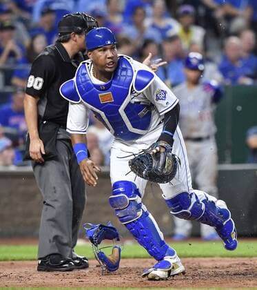 August 6, 2018 - Kansas City, MO, USA - Kansas City Royals catcher Salvador Perez chases after a wild pitch from starting pitcher Jakob Junis that allowed Chicago Cubs Ben Zobrist to score from third in the fourth inning during Monday s baseball game on August 6, 2018 at Kauffman Stadium in Kansas City, Mo. Royals vs Cubs - ZUMAm67_ 20180806_zaf_m67_027 Copyright: xJohnxSleezerx