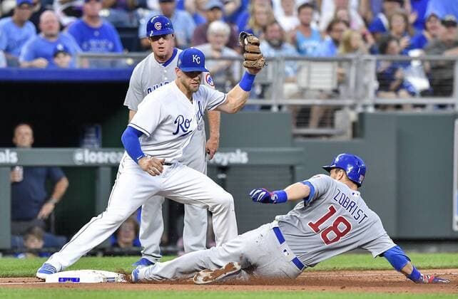 August 6, 2018 - Kansas City, MO, USA - Chicago Cubs Ben Zobrist reaches third before the tag from Kansas City Royals third baseman Hunter Dozier on a triple in the fourth inning during Monday s baseball game on August 6, 2018 at Kauffman Stadium in Kansas City, Mo. Royals vs Cubs - ZUMAm67_ 20180806_zaf_m67_033 Copyright: xJohnxSleezerx