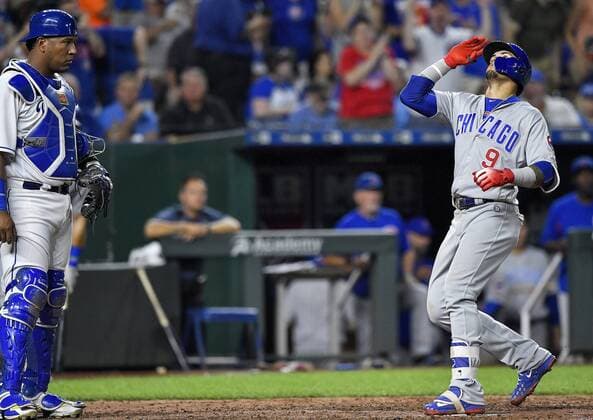August 6, 2018 - Kansas City, MO, USA - Chicago Cubs Javier Baez celebrates his sixth inning solo home run in front of Kansas City Royals catcher Salvador Perez during Monday s baseball game on August 6, 2018 at Kauffman Stadium in Kansas City, Mo. Royals vs Cubs - ZUMAm67_ 20180806_zaf_m67_049 Copyright: xJohnxSleezerx