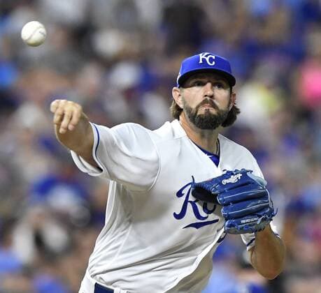 August 6, 2018 - Kansas City, MO, USA - Kansas City Royals relief pitcher Jason Hammel throw to first to chase Chicago Cubs Jason Heyward back to the base in the eighth inning during Monday s baseball game on Aug. 6, 2018 at Kauffman Stadium in Kansas City, Mo. Royals vs Cubs - ZUMAm67_ 20180806_zaf_m67_054 Copyright: xJohnxSleezerx