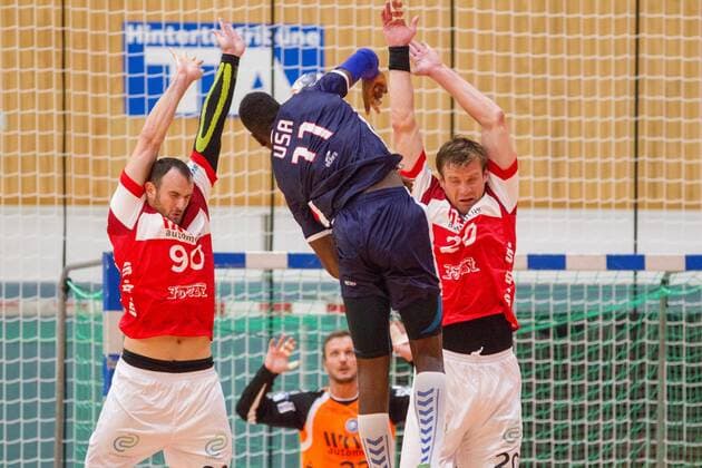 Bogdan Andrei Criciotoiu 90 Bergischer HC and Csaba Szücs 20 Bergisch HC stand in front of the throwing Abou Fofana 11 Team USA Bergischer HC vs Team USA Handball HBL Test match 07 08 18 Solingen NRW Germany Klingenhalle Copyright: xdnet_cdnx