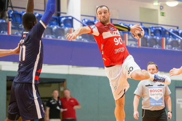 Bogdan Andrei Criciotoiu 90 Bergischer HC in the throw against Abou Fofana 11 Team USA Bergischer HC vs Team USA Handball HBL Test match 07 08 18 Solingen NRW Germany Klingenhalle Copyright: xdnet_cdnx