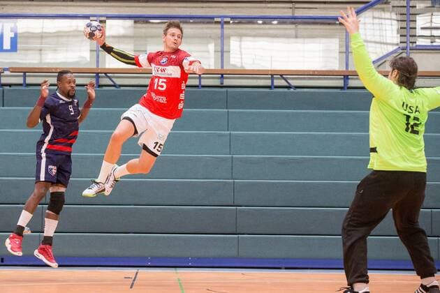 Milan Kotrc 15 Bergischer HC in the throw against Rene Ingram 12 Team USA Bergischer HC vs Team USA Handball HBL Test match 07 08 18 Solingen NRW Germany Klingenhalle Copyright: xdnet_cdnx