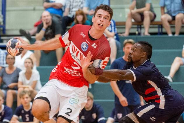 Maximilian Leon Bettin 2 Bergischer HC in a duel with Gary Hines 9 Team USA Bergischer HC vs Team USA Handball HBL Test match 07 08 18 Solingen NRW Germany Klingenhalle Copyright: xdnet_cdnx