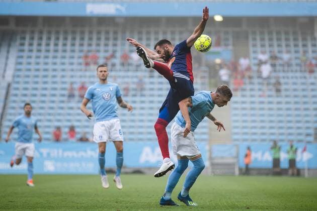 180807 Attila Fiola of Vidi and Sören Rieks of Malmö FF competes for the ball during the UEFA Champions League qualifying match between Malmö FF and Vidi on August 7, 2018 in Malmö Photo Mathilda Ahlberg BILDBYRAN Cop 178  Copyright: MATHILDAxAHLBERG BB180807MA008