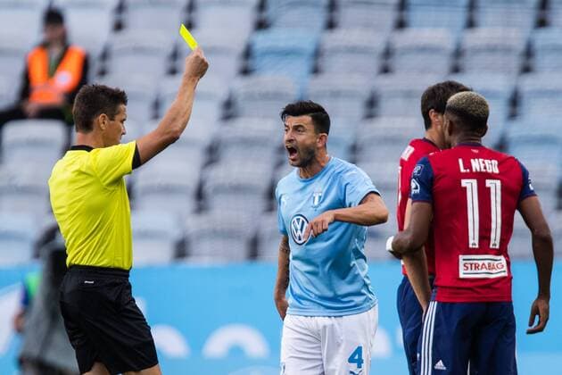 180807 Behrang Safari of Malmö FF gets a yellow card during the UEFA Champions League qualifying match between Malmö FF and Vidi on August 7, 2018 in Malmö Photo Mathilda Ahlberg BILDBYRAN Cop 178  Copyright: MATHILDAxAHLBERG BB180807MA012