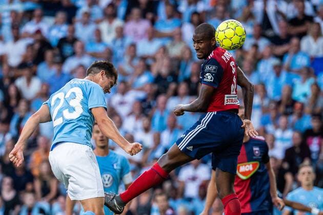 180807 Marcus Antonsson or Malmö FF with a header against Paulo Vinicius or Vidi during the UEFA Champions League qualifying match between Malmö FF and Vidi on August 7, 2018 in Malmö Photo Ludvig Thunman BILDBYRAN code LT 35513  Copyright: LUDVIGxTHUNMAN BB180807LT016