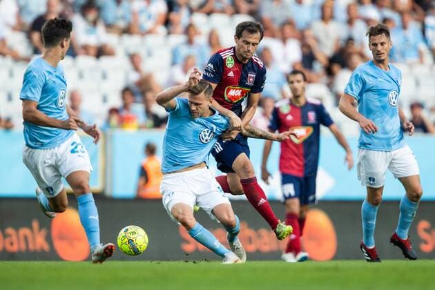 180807 Arnor Ingvi Traustason of Malmö FF and Danko LazoviÄ ? of Vidi competes for the ball during the UEFA Champions League qualifying match between Malmö FF and Vidi on August 7, 2018 in Malmö Photo Mathilda Ahlberg BILDBYRAN Cop 178  Copyright: MATHILDAxAHLBERG BB180807MA033