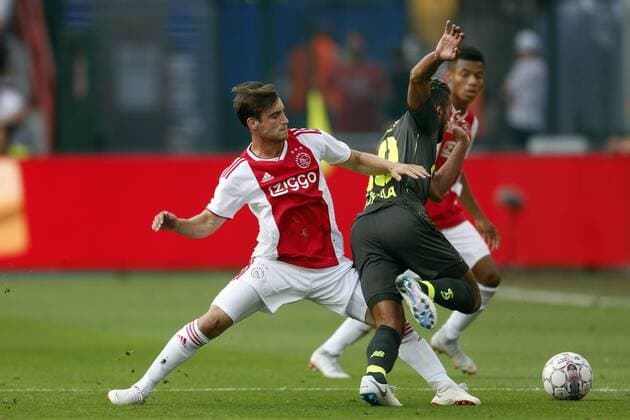 (L-R), Nico Tagliafico of Ajax, Mehdi Carcela of Standard de Liege during the UEFA Champions League third round qualifying first leg match between Royal Standard de Liege and Ajax Amsterdam at Stade Maurice Dufrasne on August 07, 2018 in Liege, Belgium UEFA Champions League 2018 2019 xVIxVIxImagesx xJeroenxPutmansxIVx 11705655